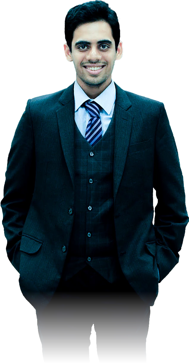 Takshak Parmar, standing, in a dark three-piece suit